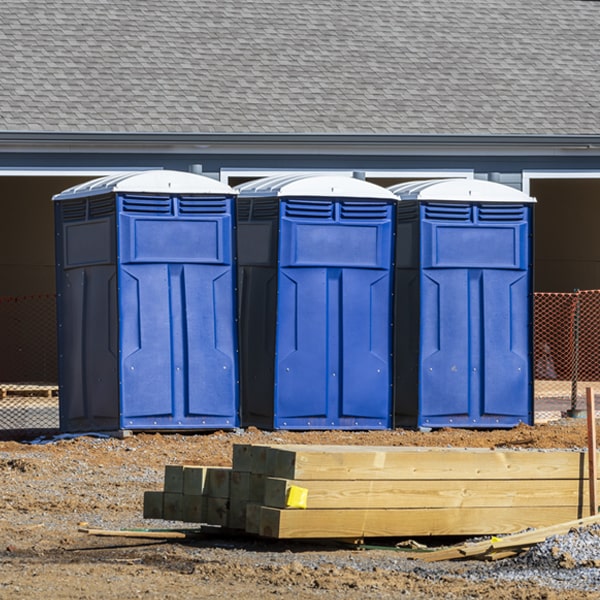 what is the cost difference between standard and deluxe portable toilet rentals in Snowville